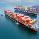 cargo ship and truck at seaport